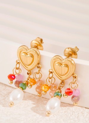 Gouden hartjes oorbellen met parels 